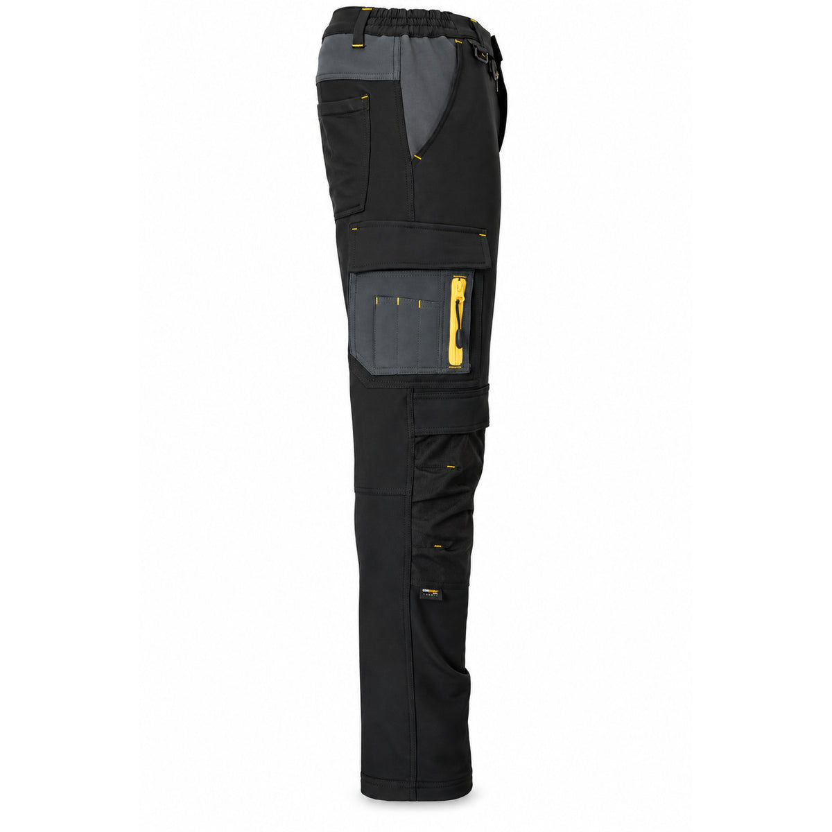 Side view of black ATOMIC technical work trousers showing cargo pockets, yellow zip and reinforced knee panel.