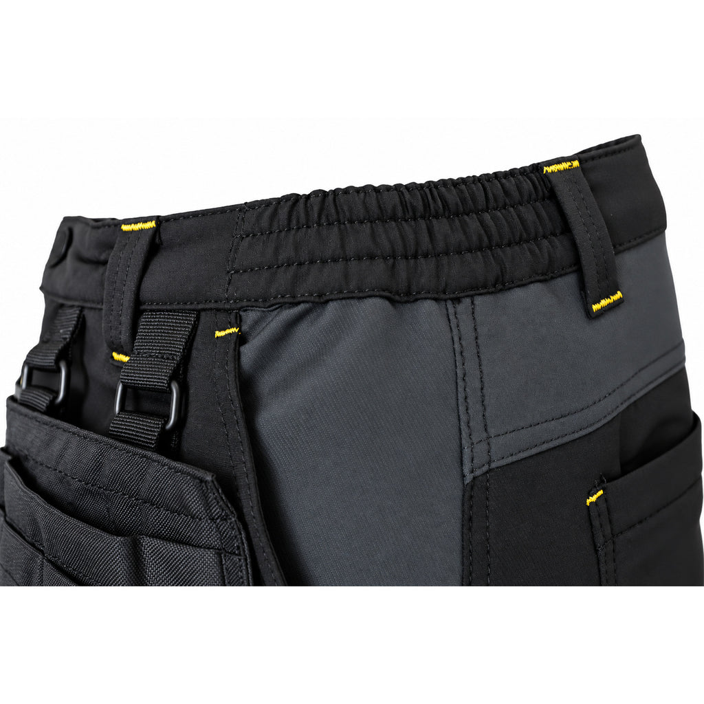 Close-up of the elasticated waistband on black ATOMIC work trousers with reinforced belt loops and attachment ring.