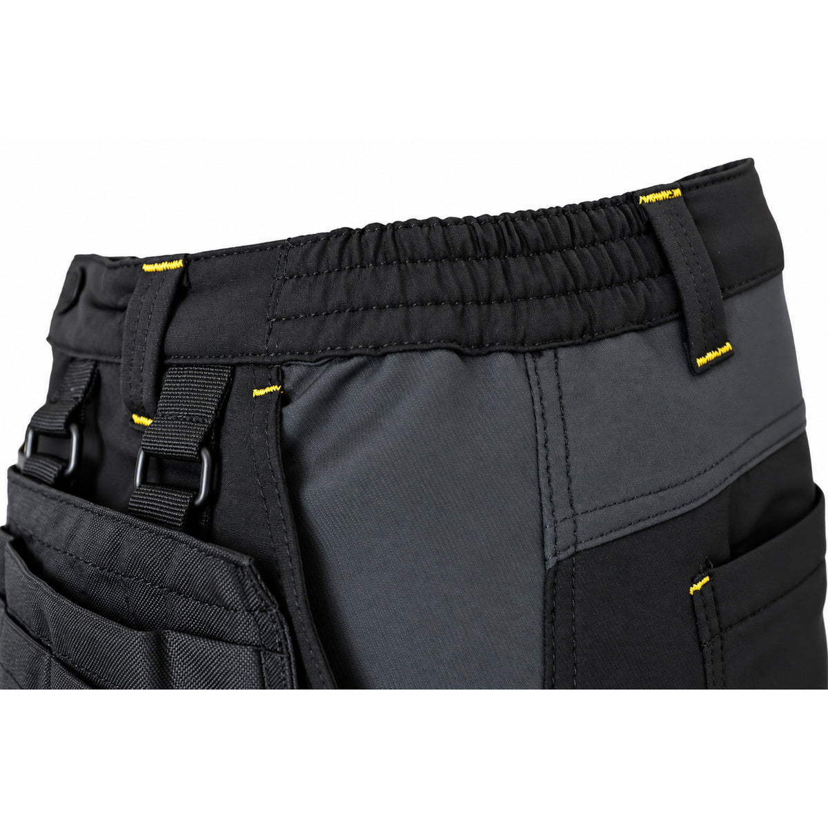 Close-up of the elasticated waistband on black ATOMIC work trousers with reinforced belt loops and attachment ring.